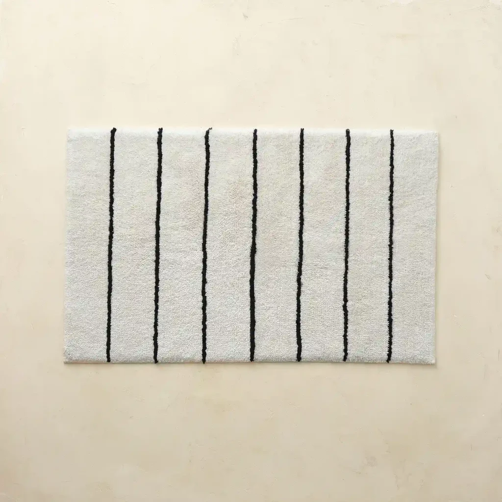 Darby Pasadena striped bathroom rug in a modern bathroom