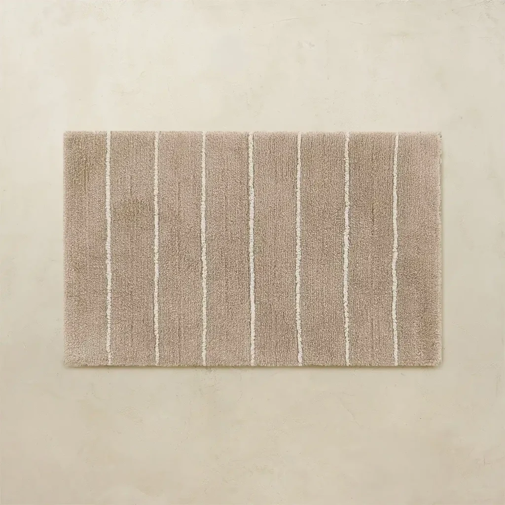Sandy beige Darby hand-tufted bathroom rug