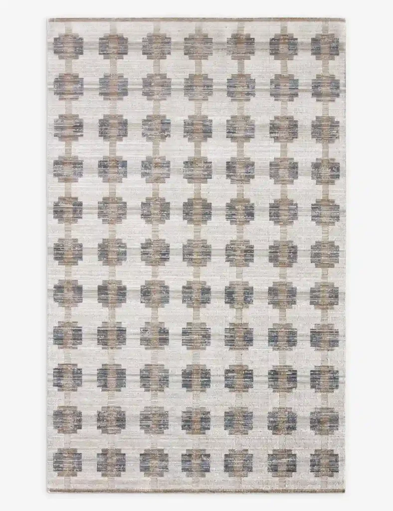 Tile-inspired geometric patio rug