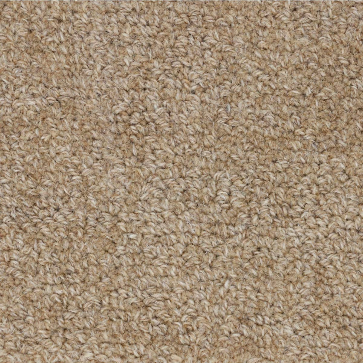 Beige Crater Lake wool area rug under a sofa