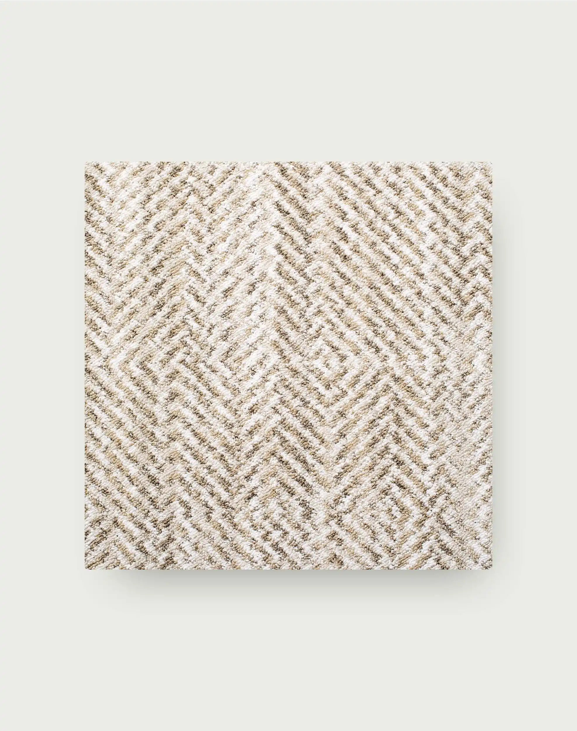 Beige herringbone carpet tile rug in a home office