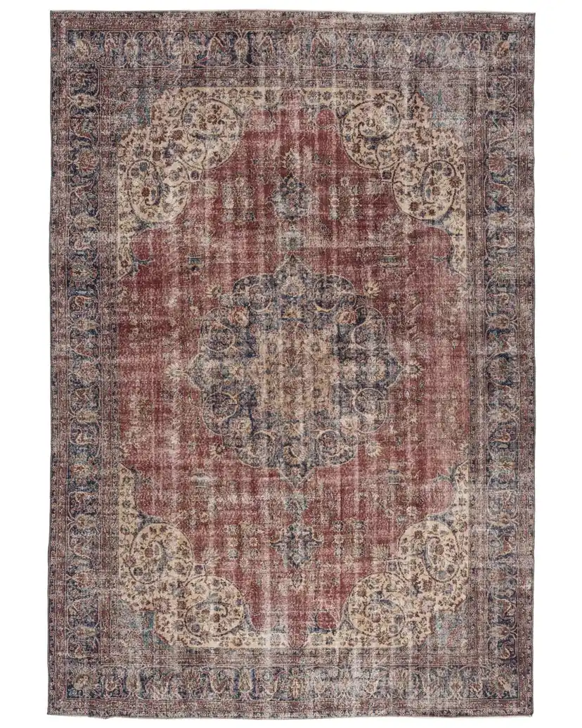 Close-up of Aena vintage rug showing hand-knotted wool texture and floral pattern