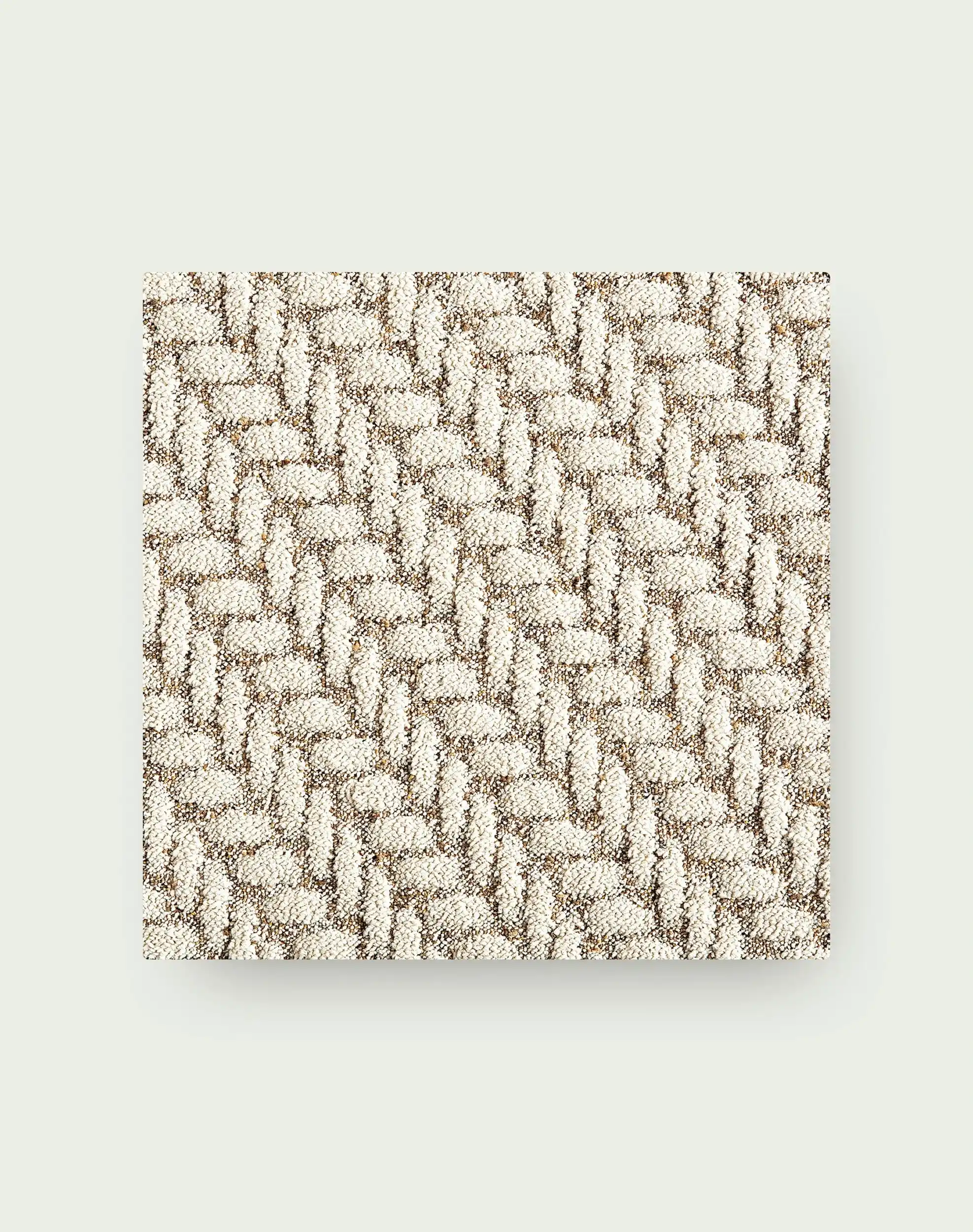 Close-up of woven herringbone carpet tile texture