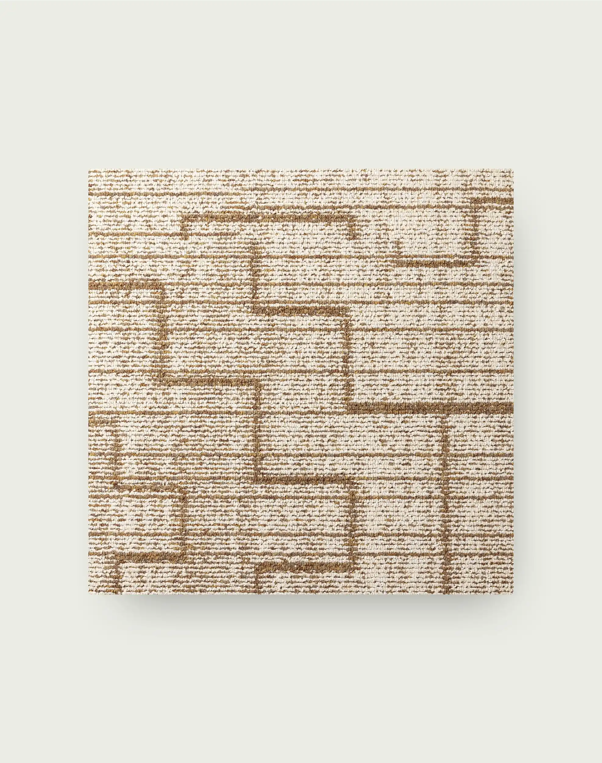 Geometric neutral carpet tile rug in a modern living room