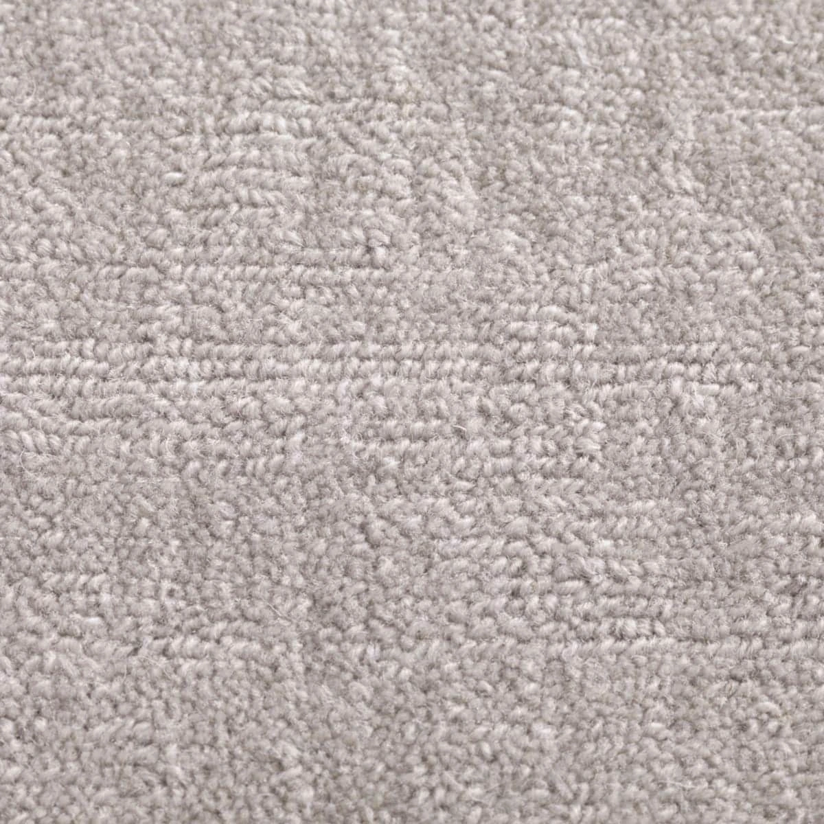 Green handwoven wool rug in modern living room (2)