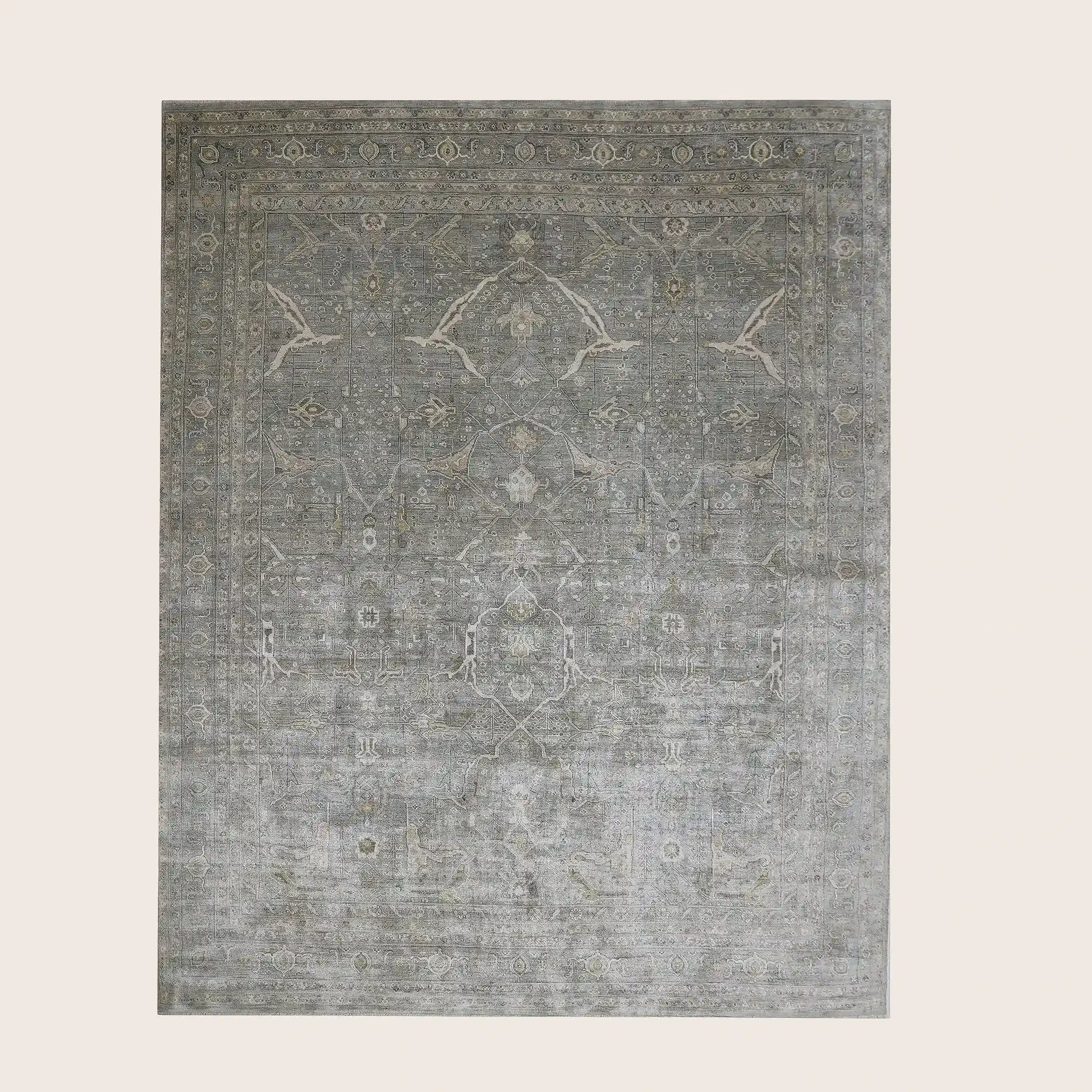 Intricate floral and geometric pattern on silk rug