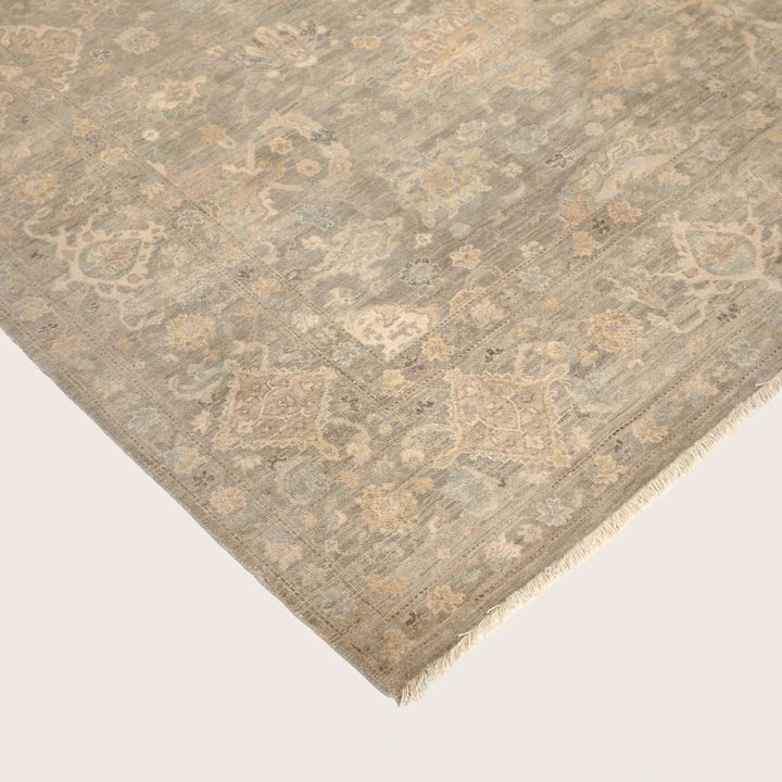 Ornate floral geometric pattern on grey silk rug