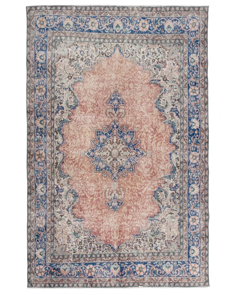 Valara vintage Turkish rug with coral medallion field and blue floral border, full top view